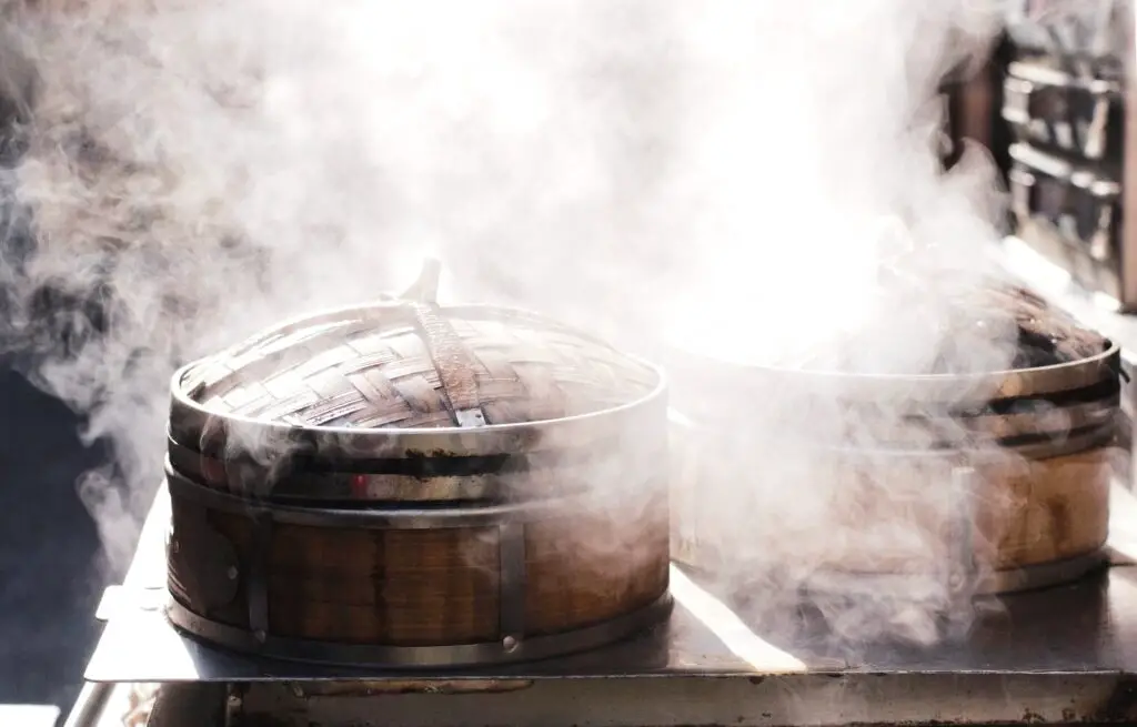 Steamer in Chinatown. Steam. Steamy. Bamboo steamer. Dumplings.