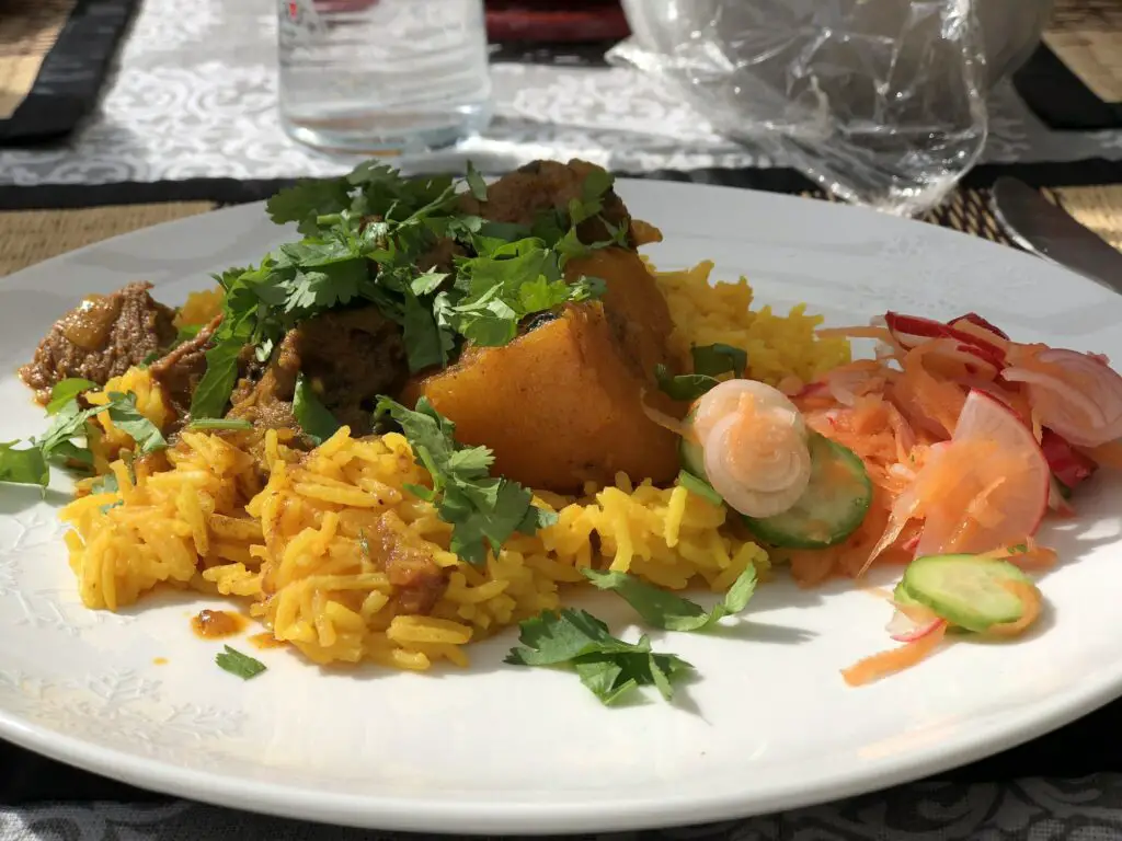 Lamb curry with potatoes on tumeric rice