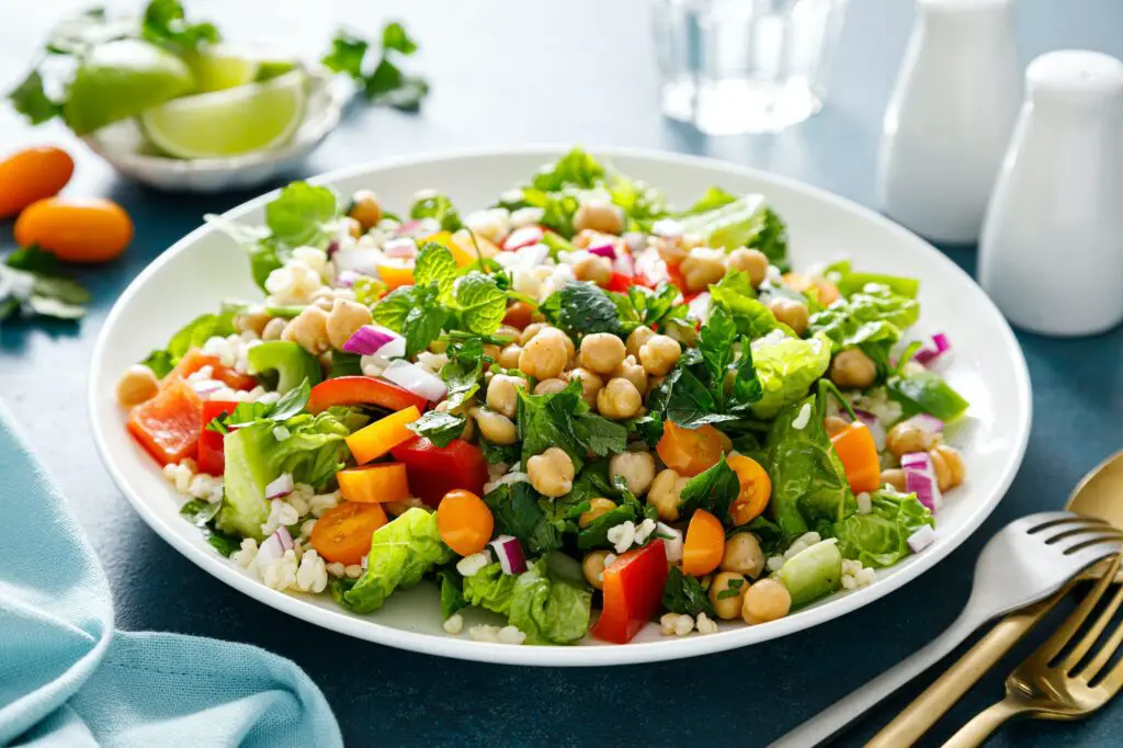 Tabbouleh salad. Tabouli salad with fresh parsley, onions, tomatoes, bulgur and chickpea