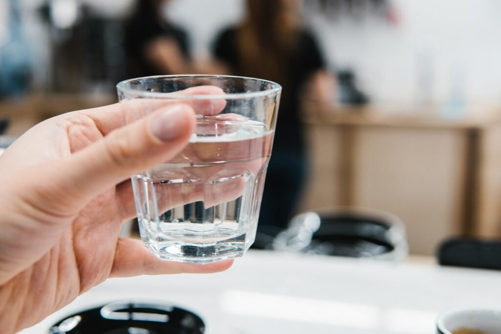 glass of water in hand