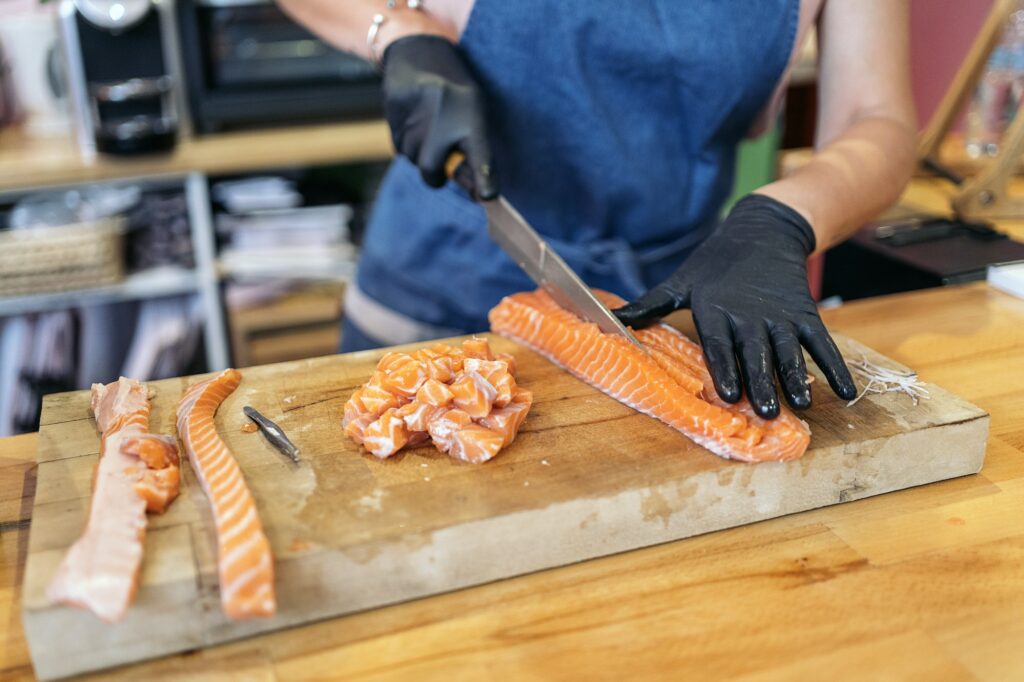 Preparing Salmon in Restaurant